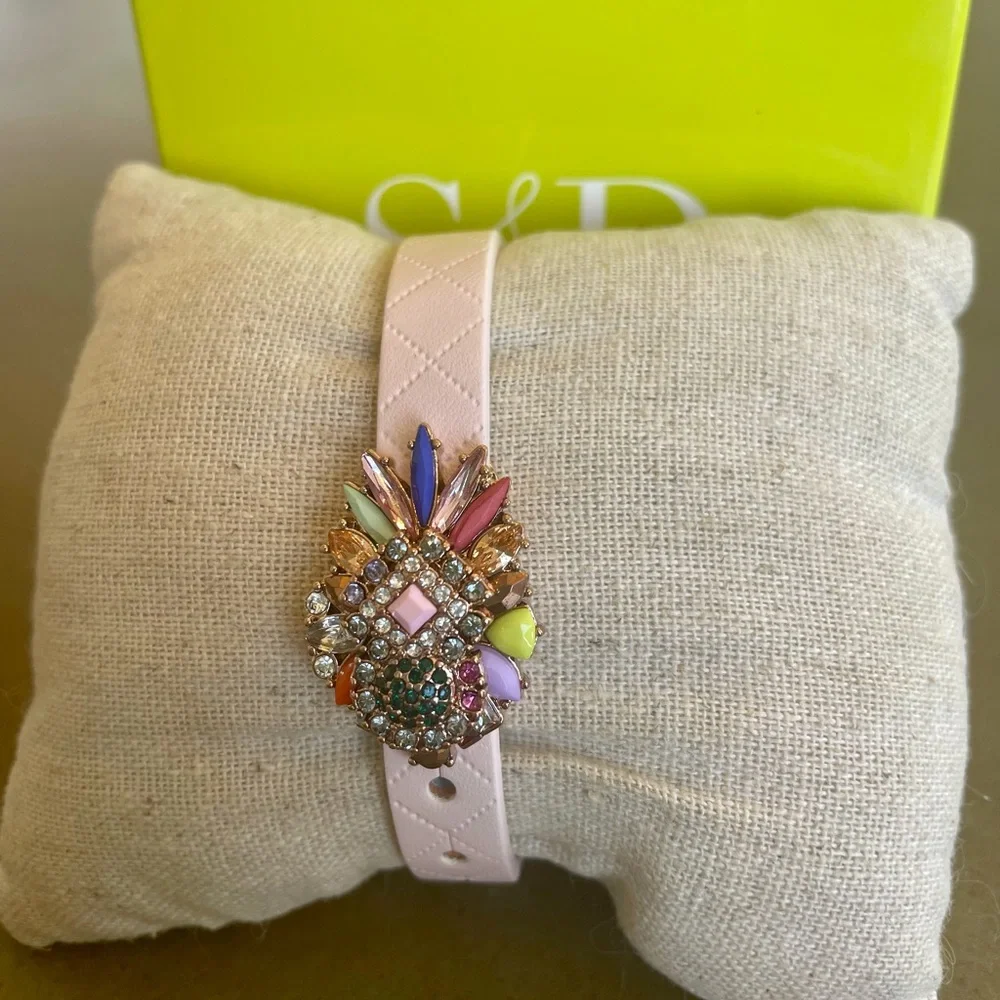 KEEP Collective pink quilted band and rose gold jeweled charm.